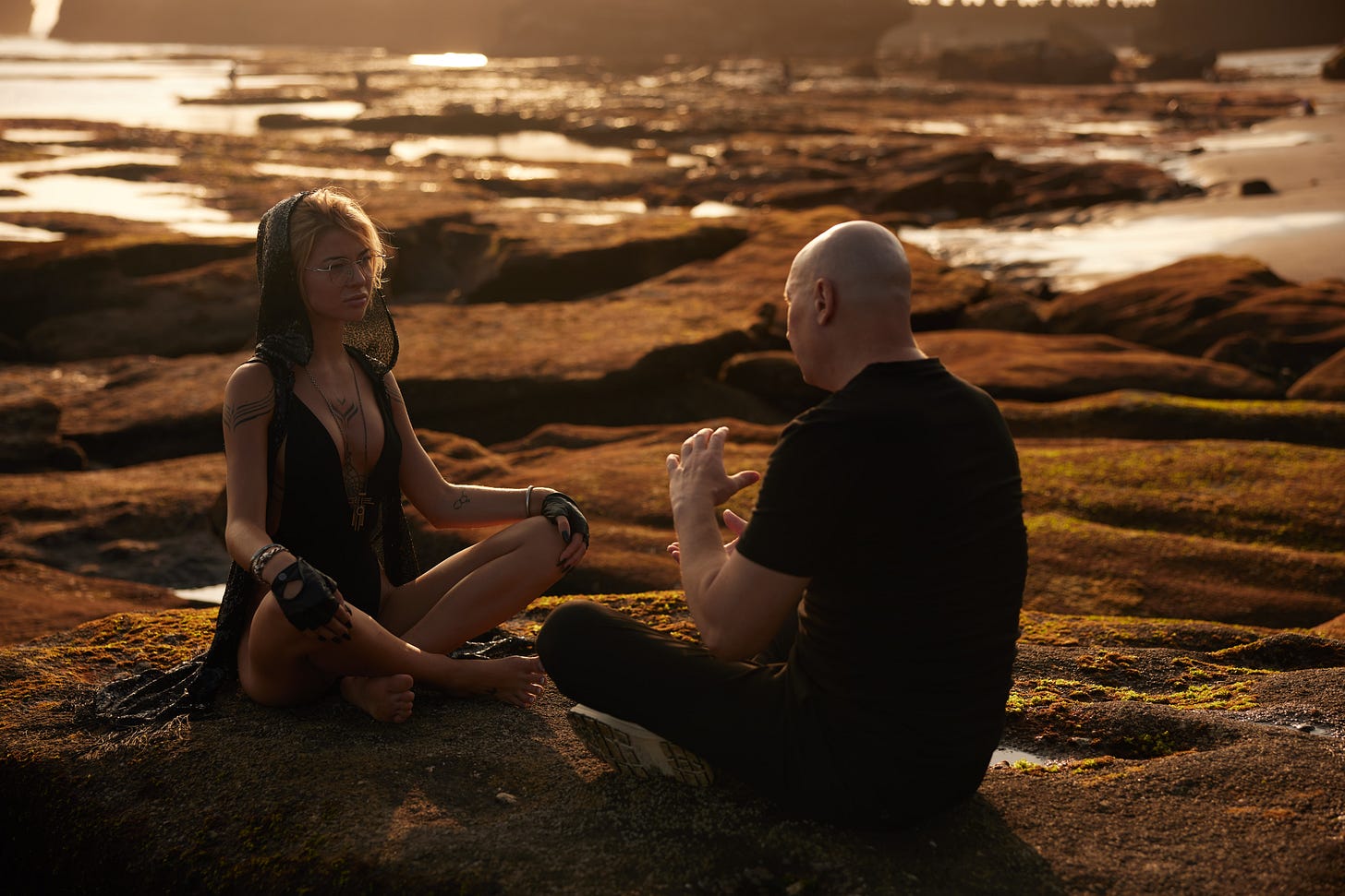 Russian psychic Stanislav conducting energetic reading session at sunset beach