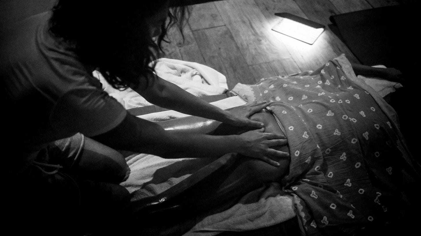 Yoga retreat participants in deep meditation and spiritual practice session